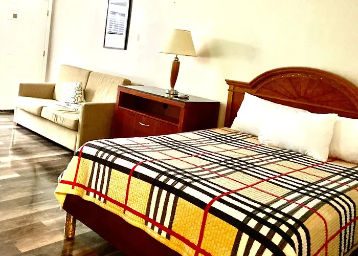 Apm Inn & Suites