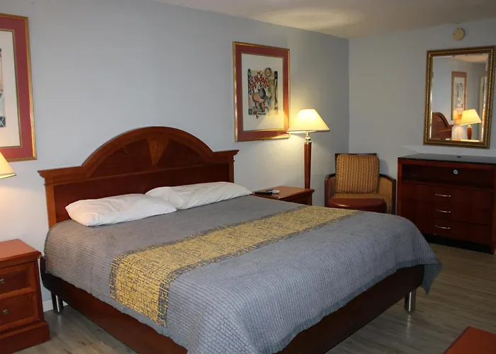 Apm Inn & Suites